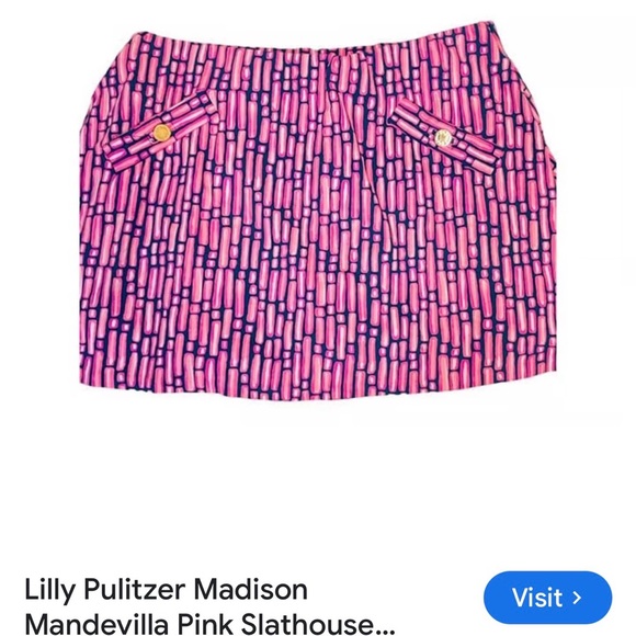Lilly Pulitzer Pink and Teal Patterned skirt with teal shorts underneath. - Picture 1 of 4